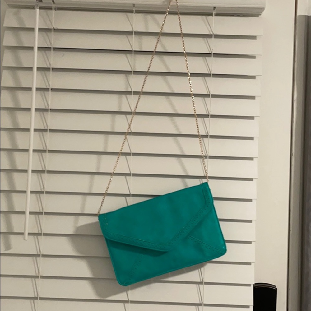 Large teal faux leather clutch with shoulder chain